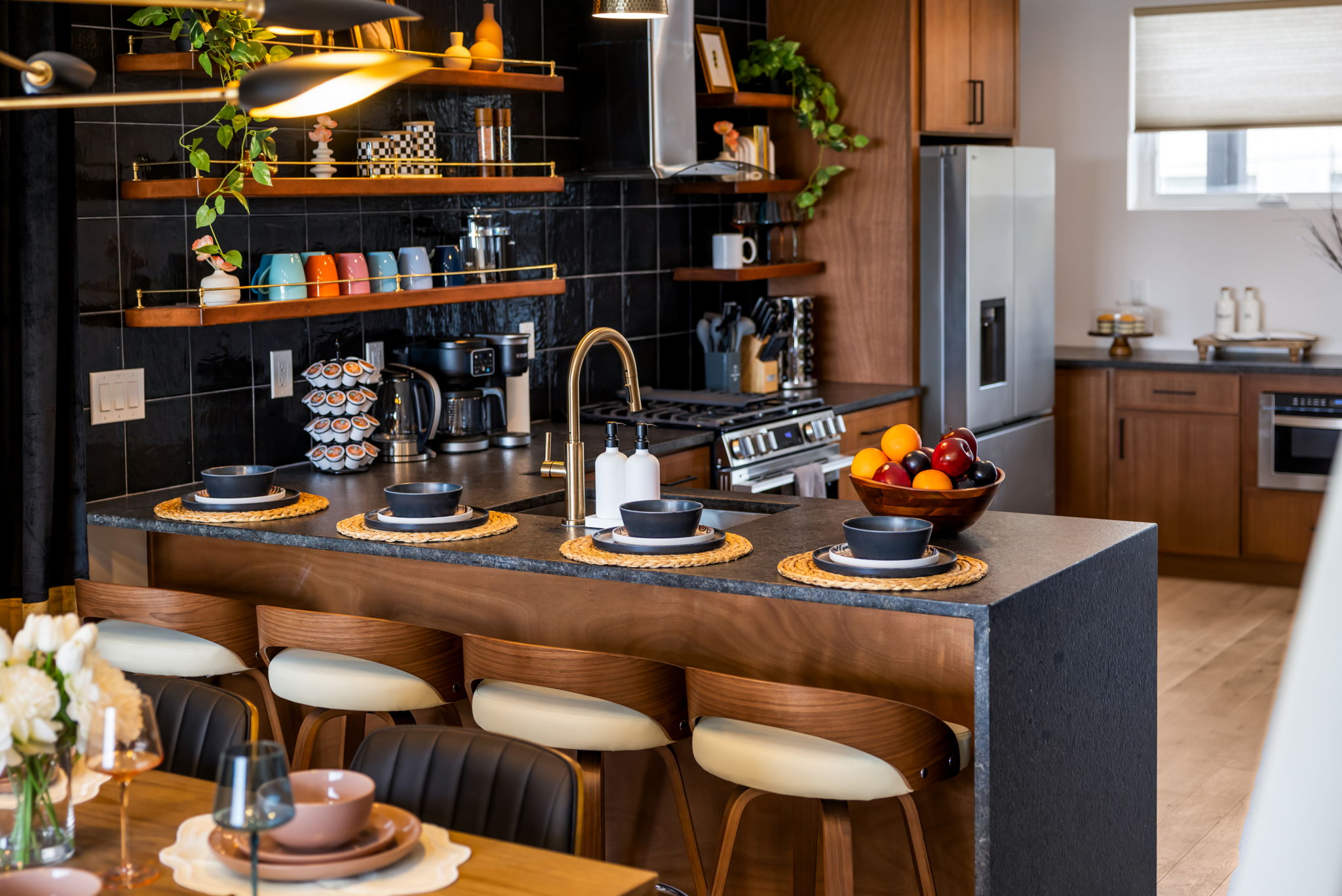 132 Prospect Street · Kitchen with warm cabinetry and dark tile