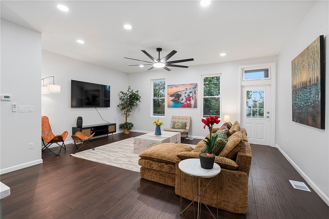 3354 Ridgway Street · A bright living room at the front of the home